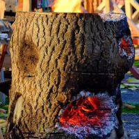 How To Make A One Log Rocket Stove - This is a good twist to a Swedish candle and once its been used as a rocket stove to many times you can just use the whole log to place on the fire.