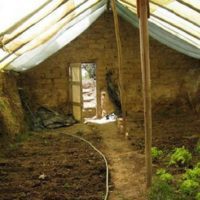 How To Build An Underground Greenhouse And Have Food All Year Round &mdash; One of the main principles involves embedding the greenhouse in the earth to take advantage of the earth&rsquo;s constant temperature, to store the solar energy collected during the day.
