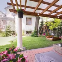 Outdoor furniture under a pergola