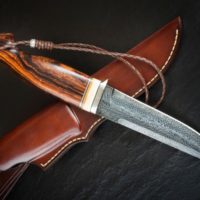 Survival knife with brown cover