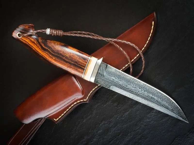 Survival knife with brown cover