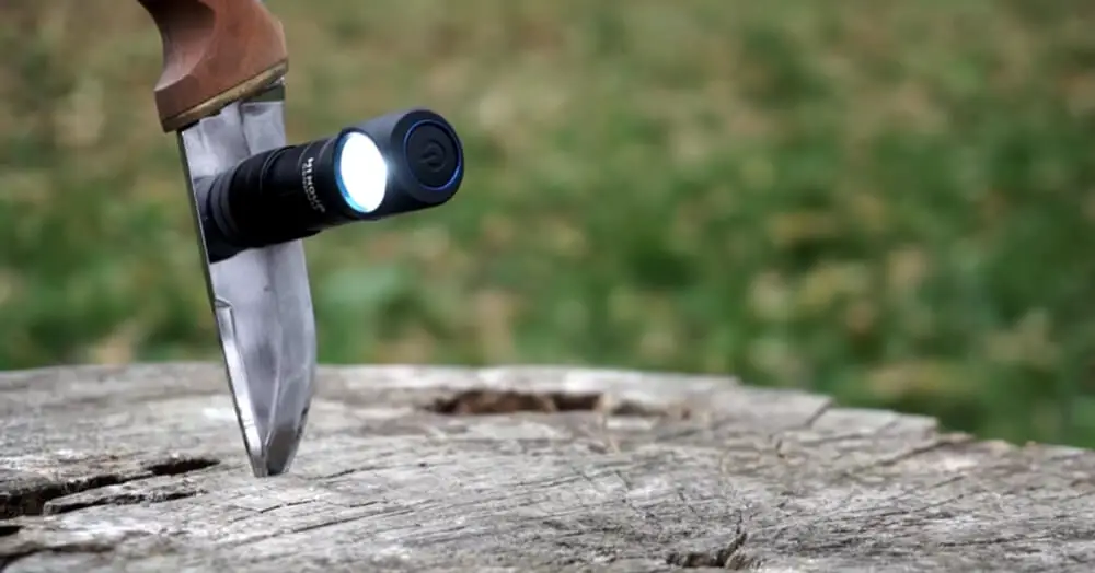 Olight H1 Nova Survival Flashlight and Headlamp Review - The Olight H1 Nova is a flashlight and fully functional headlamp with 7 unique settings. It’s the perfect item for a prepper, surivalist or outdoorsman.