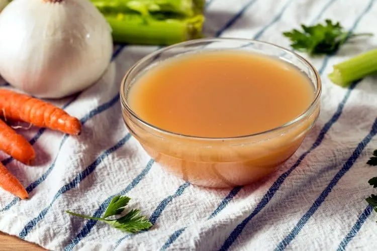 This 'Simple Bone Broth' home remedy recipe is loaded with nutrients extracted from bones, connective tissue, marrow, collagen, and fascia to help soothe gastritis.