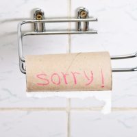 an empty toilet paper roll with the words 