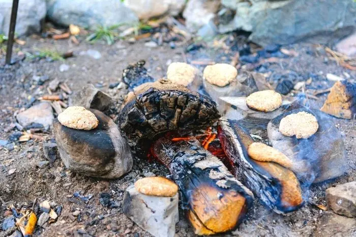 primitive cooking methods on hot stones