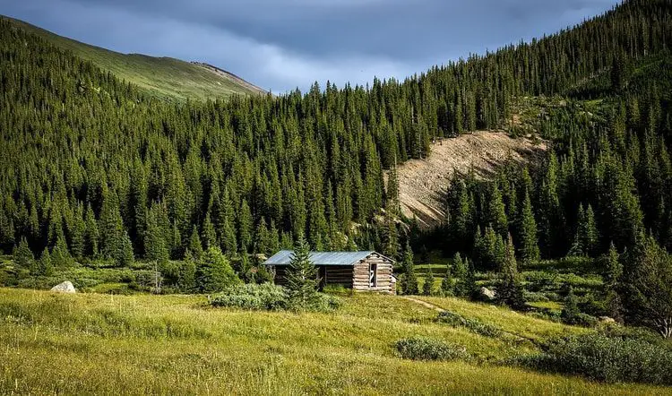 log cabin mountain landscape