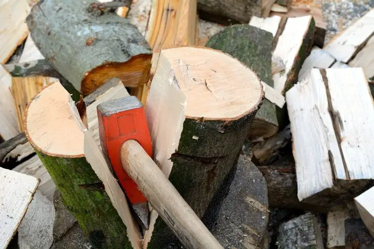 splitting wood with an axe