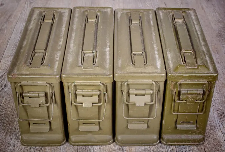 4 ammo cans lined up for storage