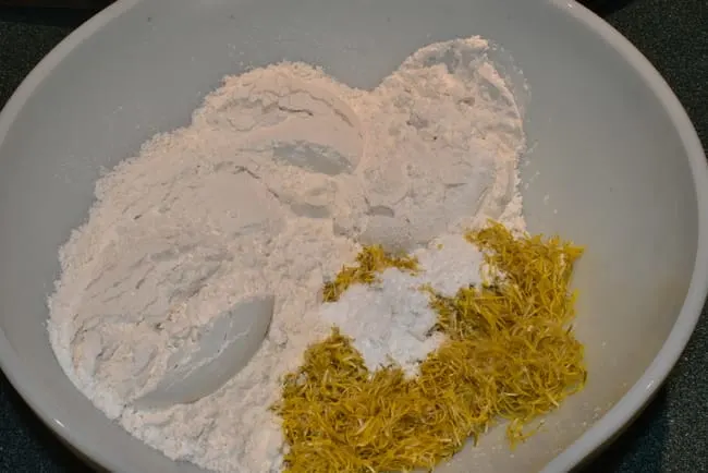 mix flour, salt, dandelion petals, baking powder in bowl