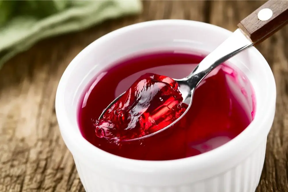 Red jello on a white ceramic container