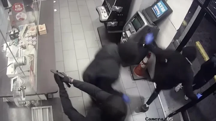 Black-clad wannabe thugs — at least one of them armed — try their hands at ripping off Philly ATM. Despite their earnest kicking and pounding, it’s a hilarious fail.