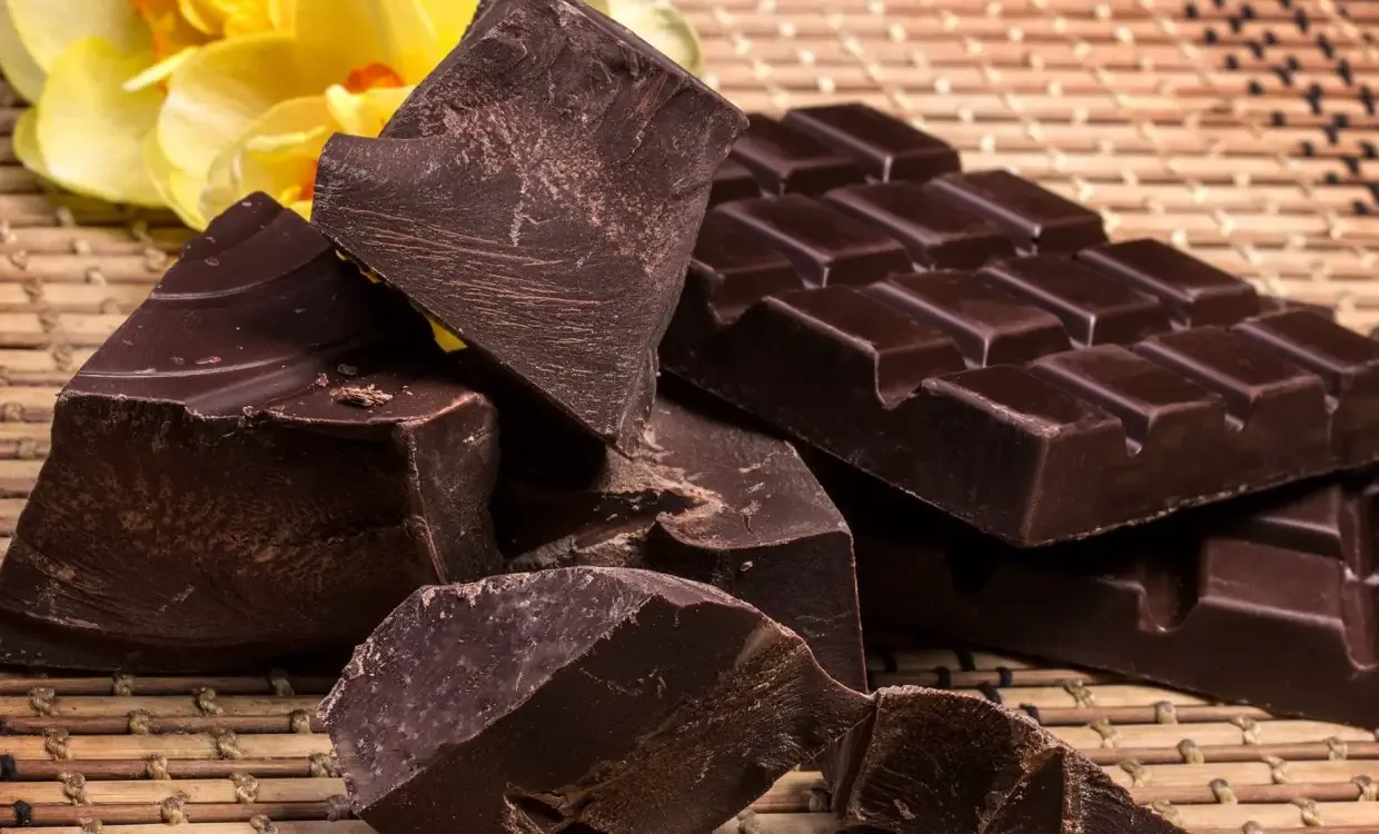 Dark chocolate should be stored in an airtight container in a cool, dry place away from sunlight