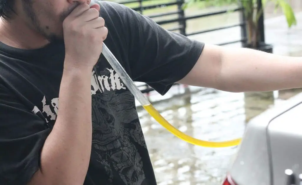 How to Siphon Gas Out of a Car? Mastering Fuel Extraction 2 Traditional siphoning technique