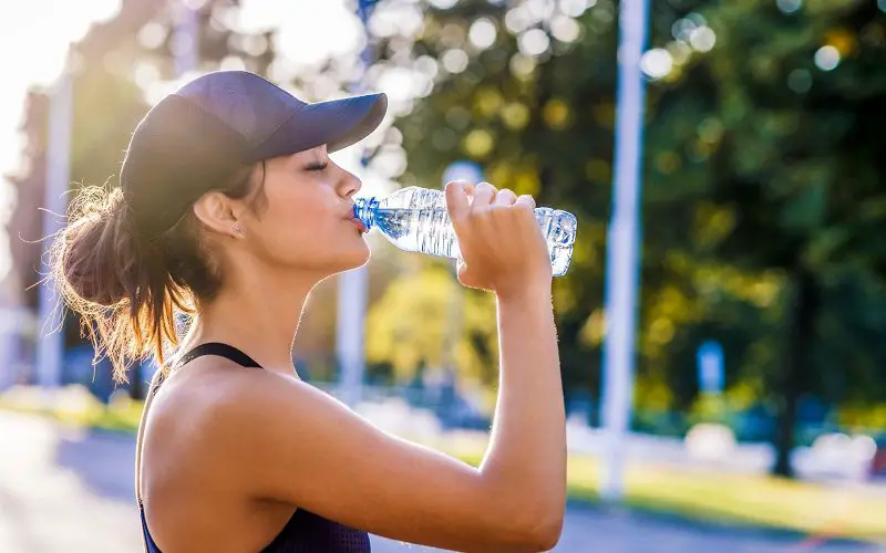 How to Survive a Heat Wave: Learn the Basics 5 drinking water outside