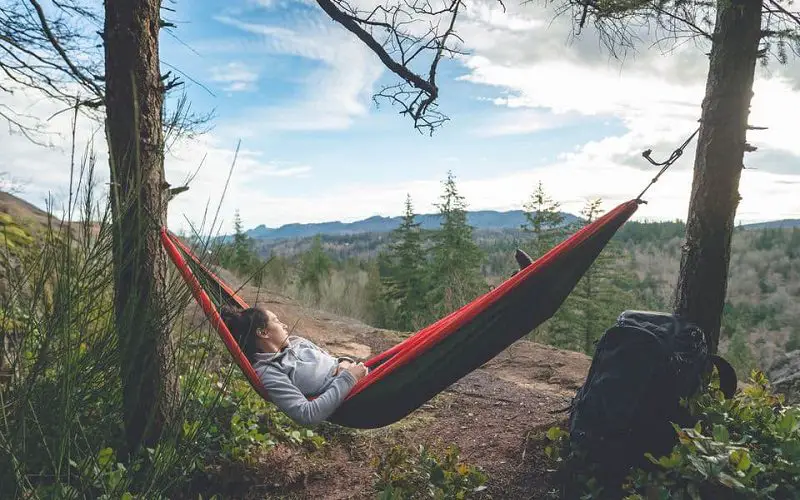 Hammock Camping: 10 Tips for Safety and Survival 5 hanging a hammock