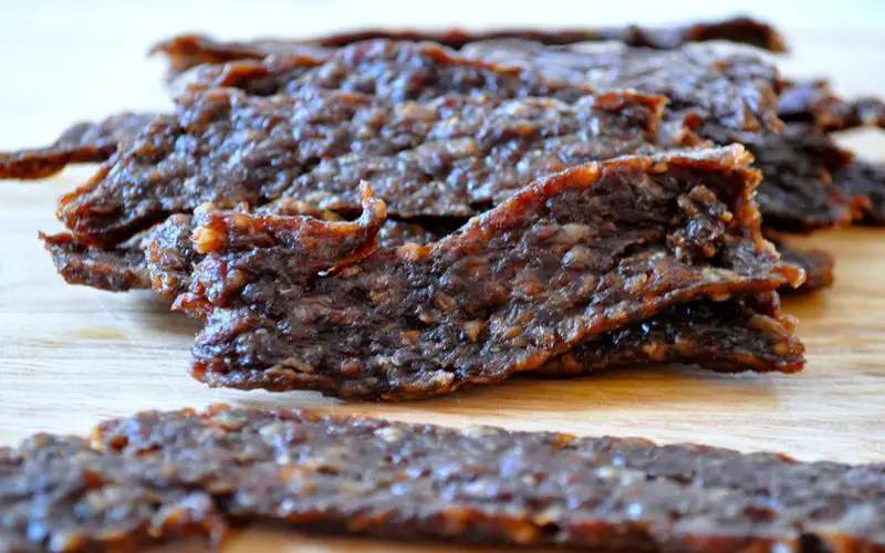 30 Proven Hiking Hacks for a Smooth Journey 3 dehydrate beef jerky on table
