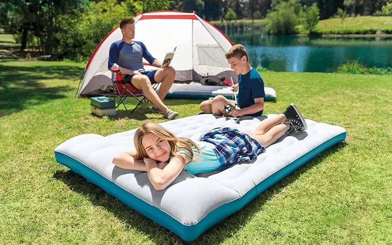 Best Camping Mattresses to Sleep Like a Champ 8 enjoying time on camping mattress