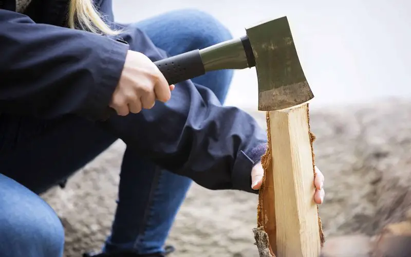 What is a Hatchet Used For? 10 Survival Uses Explained 2 chopping a campfire wood