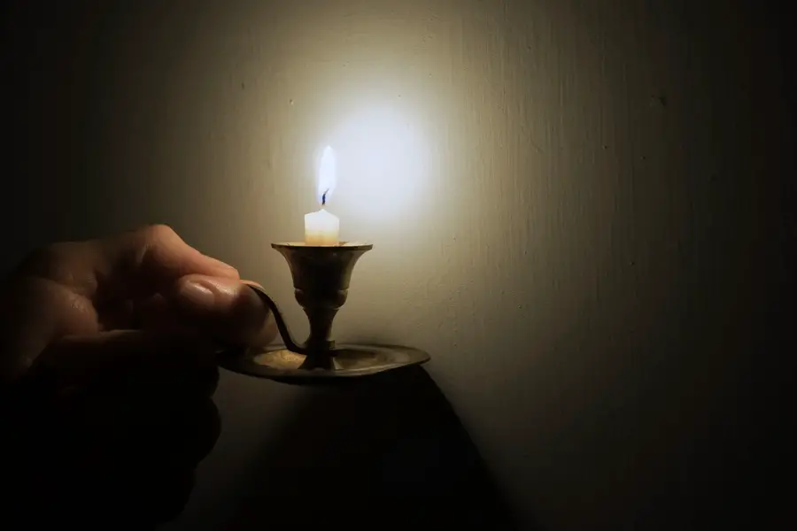 using candle during a blackout situation at home